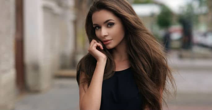 Beautiful brown-haired model enhances her beauty with BOTOX